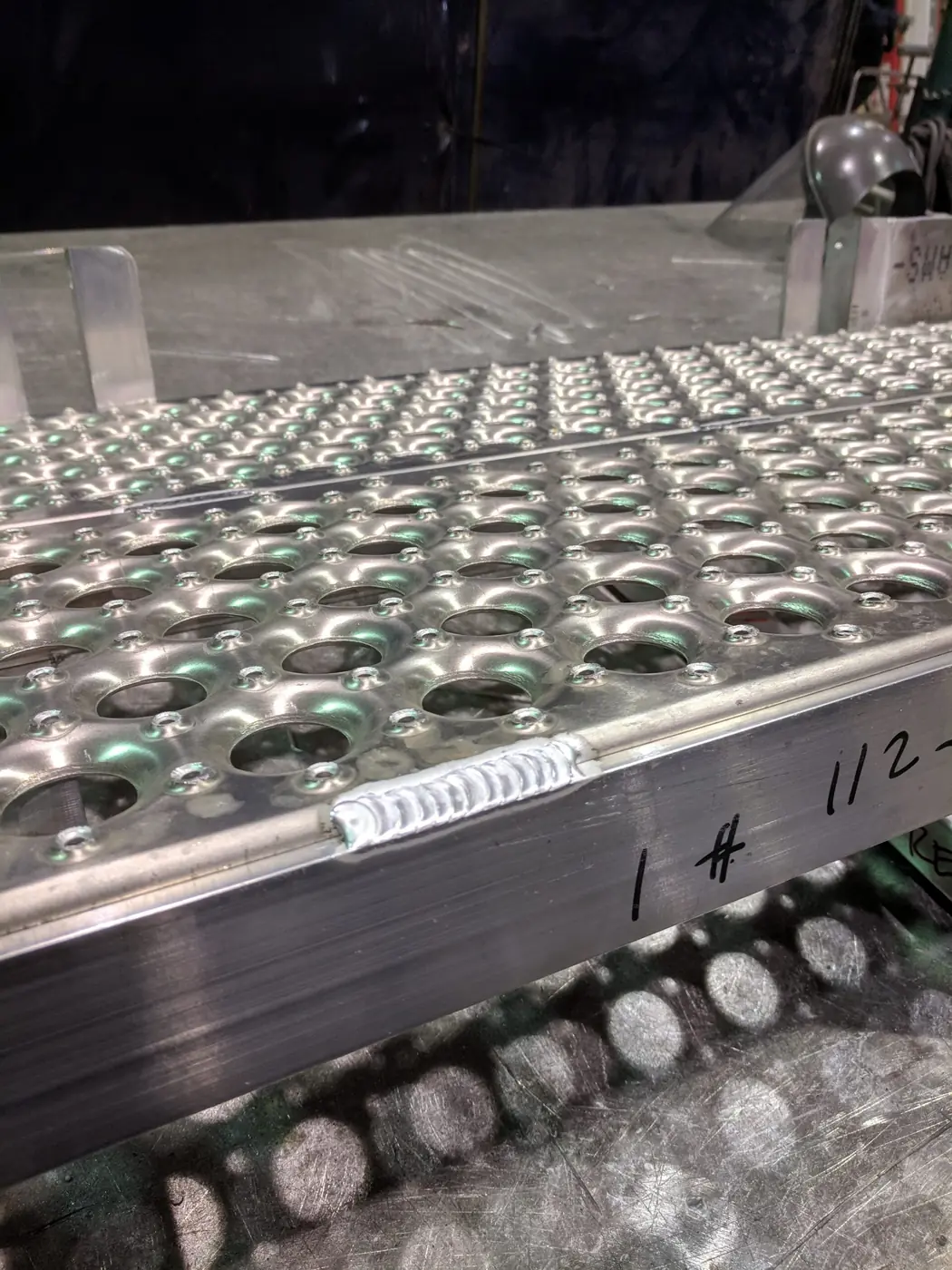 Aluminum steps with grip-strut treads