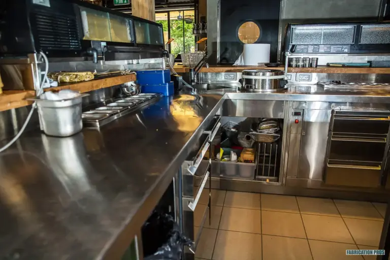 Stainless steel counters and equipment in a restaurant kitchen
