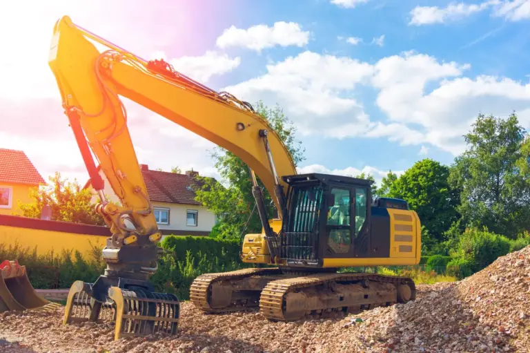 Yellow excavator on a construction site