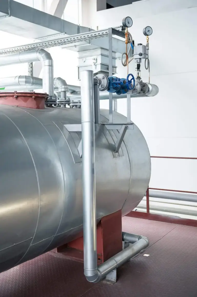 Insulated pressure vessel and piping in an industrial facility