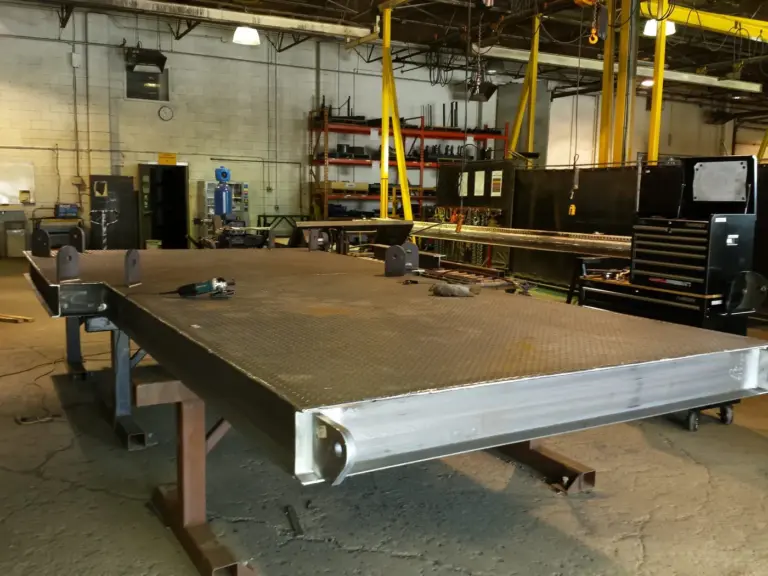 Steel skid package frame being fabricated in the shop